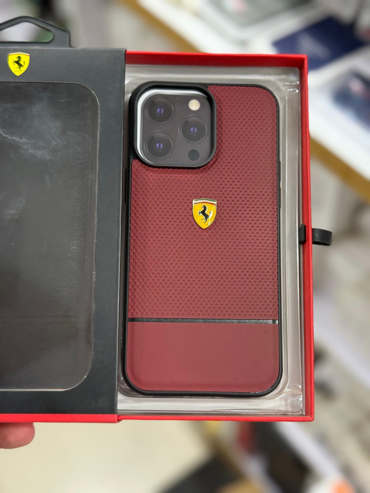 CG mobile Ferrari series maroon case for iPhone 14/15 pro max