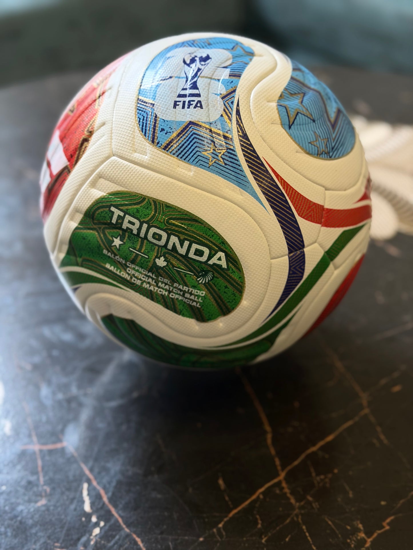High-quality Trionda football with durable construction suitable for grass, turf, and artificial playing surfaces