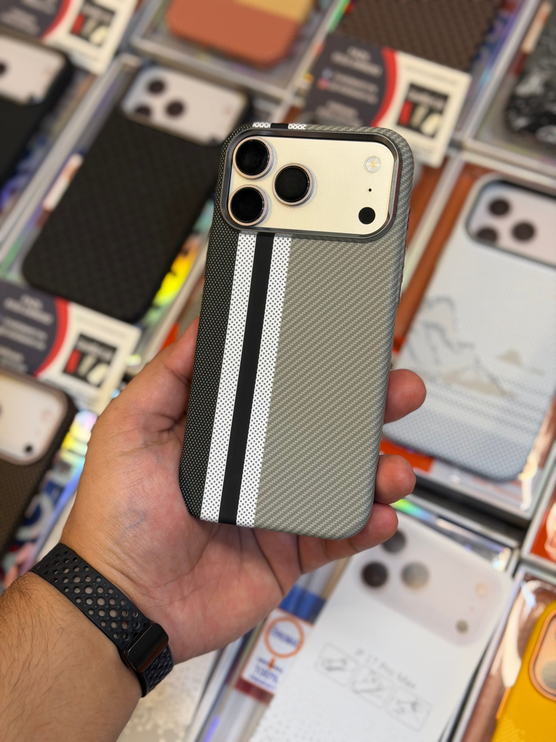 Metallic camera ring detail on Fusion Wave carbon fibre case